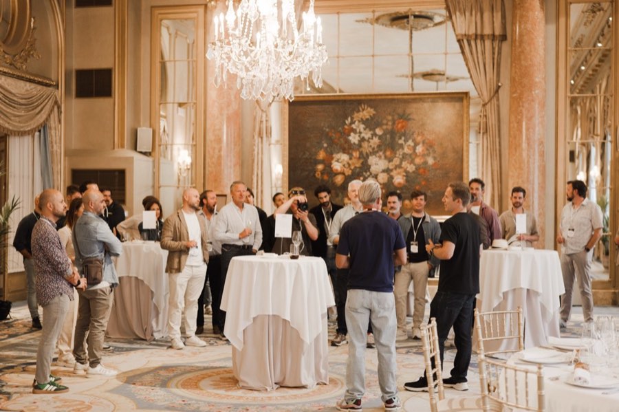 Founders talking at a standing reception